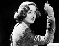 Davis with a cigarette: as the public and the impersonators remember her