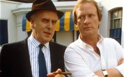 Cole and co-star Dennis Waterman in British TVâ€™s long-running Minder 