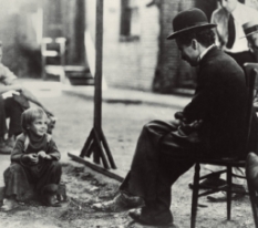 Jackie Coogan and Charlie Chaplin on the set of The Kid