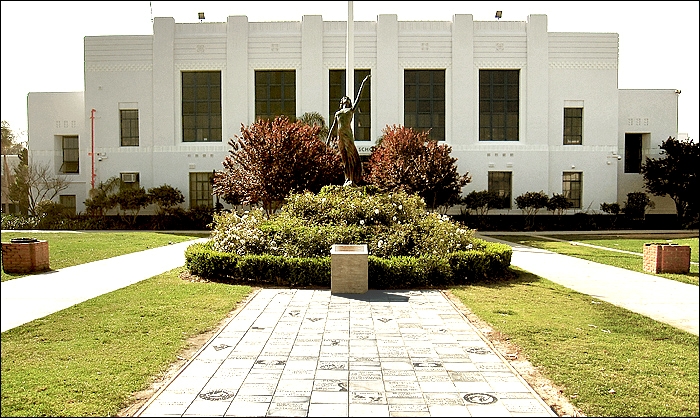 By popular demand: Myrna Loy is back where she belongs, gracing the entrance of her old alma mater