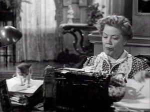 You Canâ€™t Take it With You: Spring Byington as Penny Sycamore, a woman who became a writer because a typewriter was delivered to her house by mistake (and who wrote amid a commotion of kittens; note the furry paperweight)