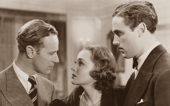 Leslie Howard, Olivia de Havilland and Patric Knowles in It's Love I'm After