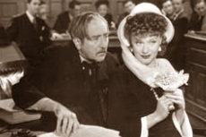 Ginger Rogers and Adolphe Menjou in "Roxie Hart"