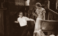 Dorothy Boyd and Laurence Olivier in Too Many Crooks